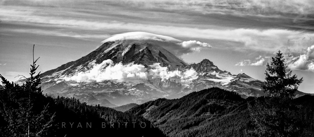 Tahoma - Black and white photo of Mt Rainier with a lenticular cloud covering the top