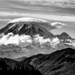 Tahoma - Black and white photo of Mt Rainier with a lenticular cloud covering the top
